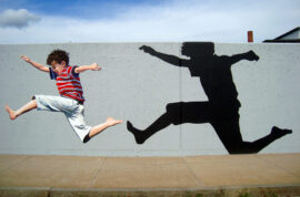 Woonsocket Kids Mural Painted on Two Large Retaining Walls by The Art Of Life