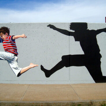 Woonsocket Kids Mural Painted on Two Large Retaining Walls by The Art Of Life