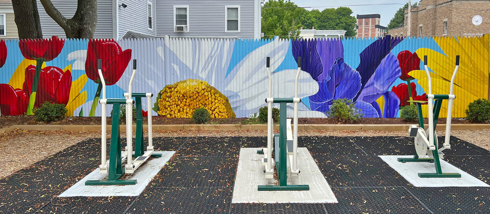 Flower Power Mural Painted on a Fence by The Art Of Life