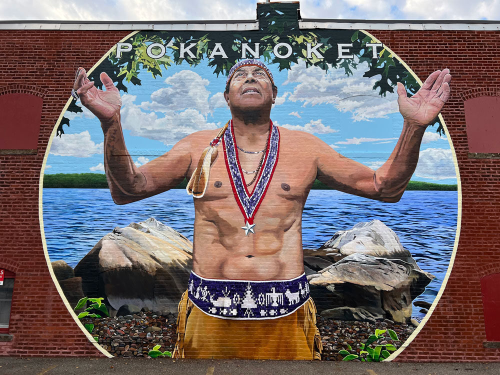 Mural featuring the Pokanoket leader Metacomet standing at Potumtuk. Painted by Charles C. Clear and Bonnie Lee Turner.